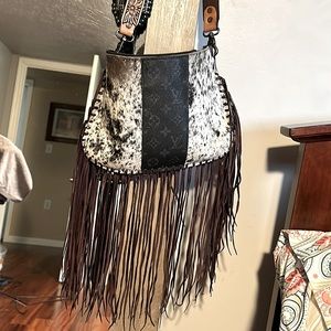 Louis Vuitton cross body fringe purse